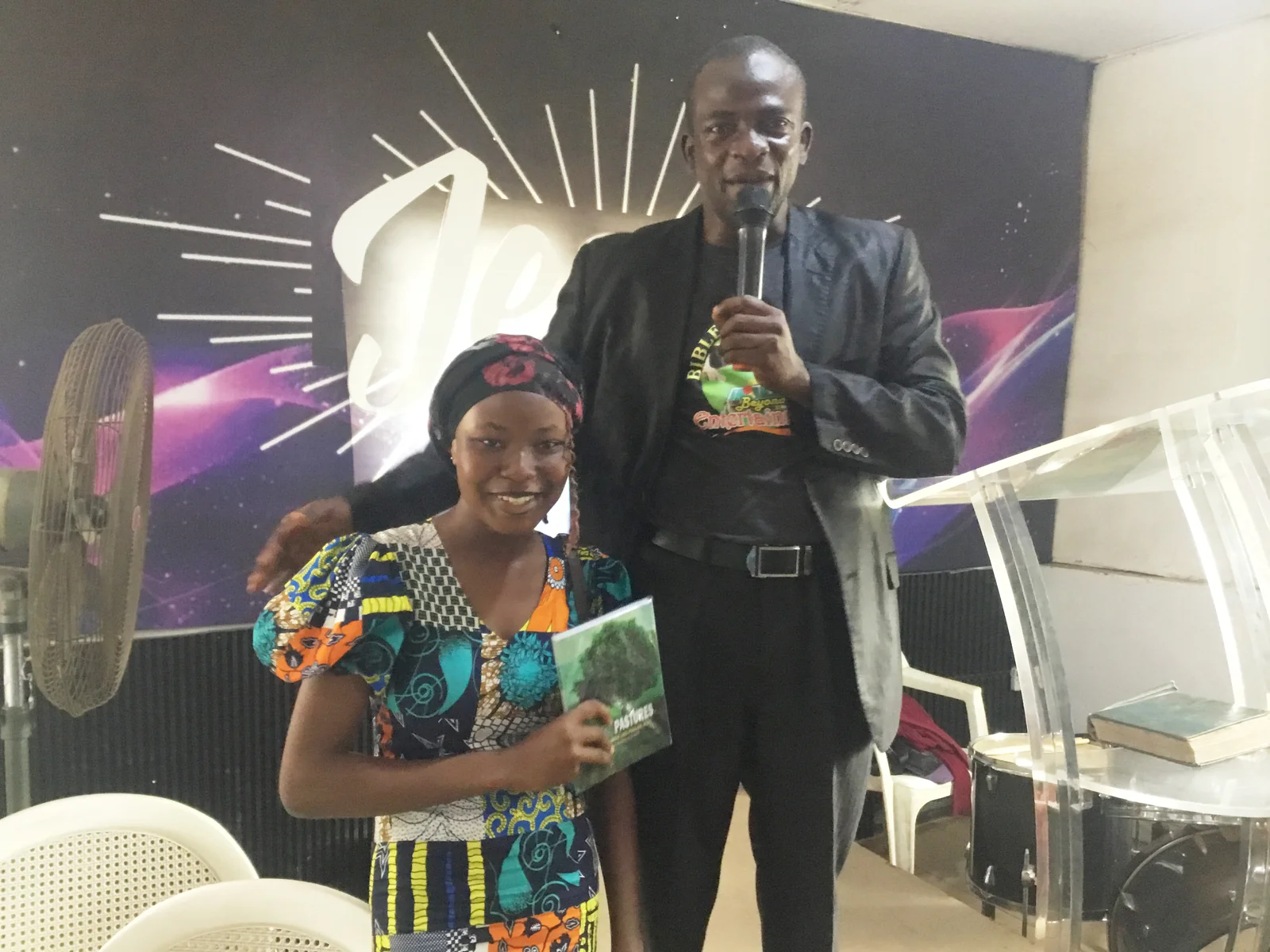 A game winner receiving gift at Molete Baptist Church Games fellowship.jpg