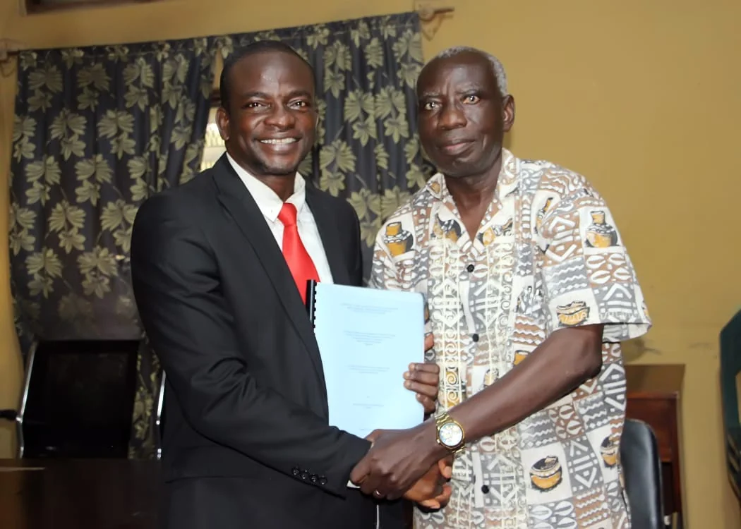 With the Dean of Post Graduate School, Dr. Ishola after my External Defence.jpeg