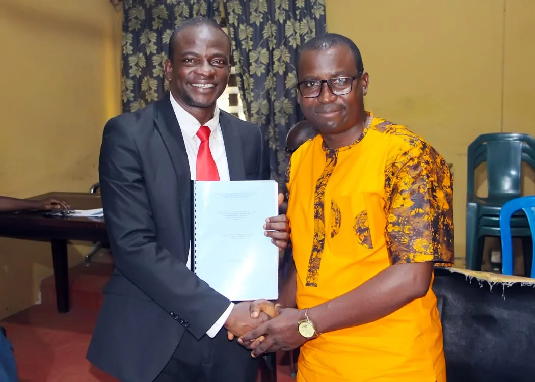 With the Sub-Dean of Post Graduate School, Dr, Felix Ajedokun.jpeg