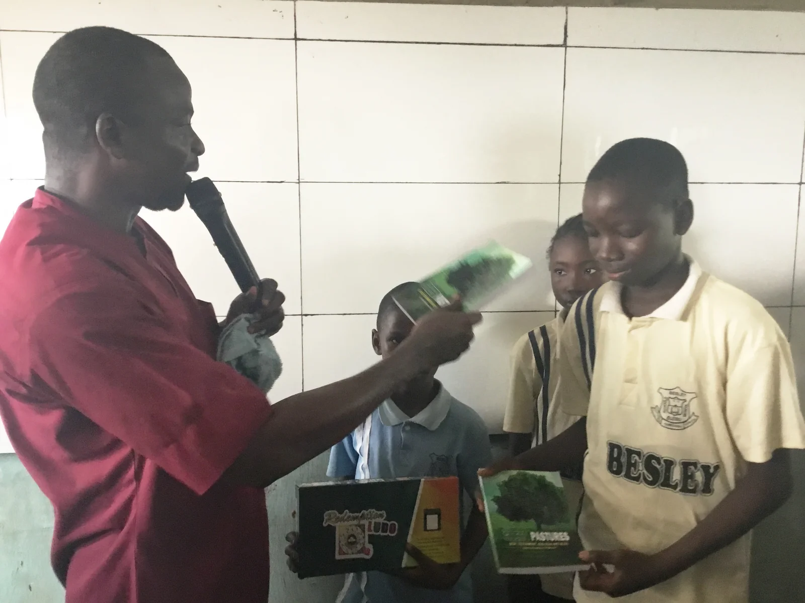 Presenting gifts to winners of games session in Bestley School.jpg