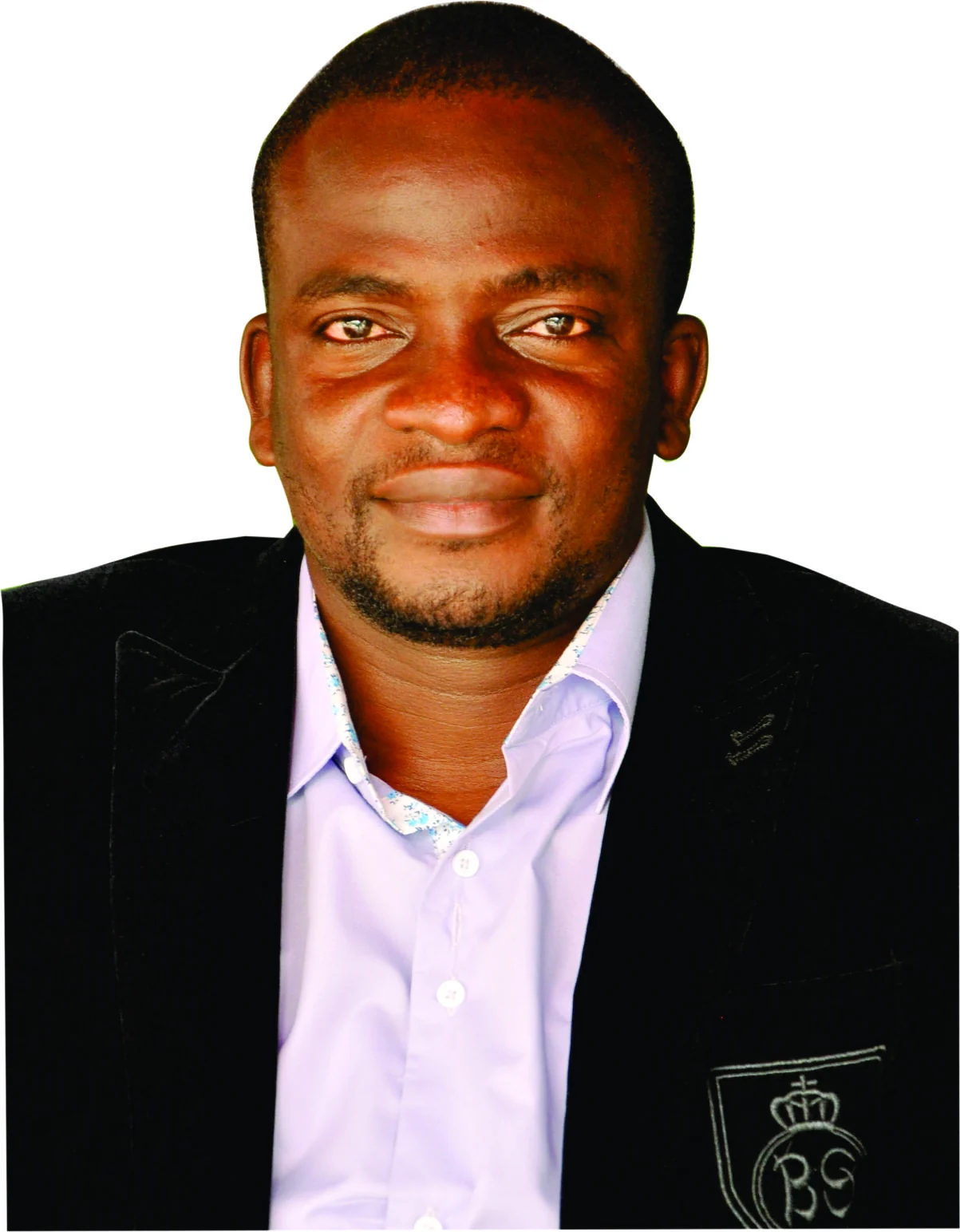 Professional head-and-shoulders portrait of Dr. Olajide A. Aderinto in a black jacket and pale lavender shirt